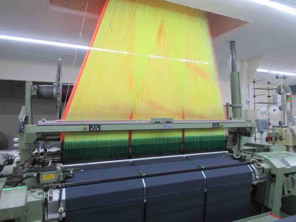 A loom with yellow warp