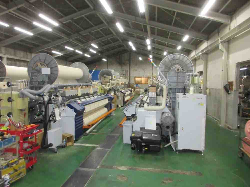 Looms running the length of a mill